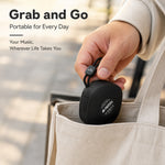 AEMAI mini speaker grab and go portable for every day held by hand placing into tote bag pocket size