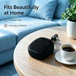 AEMAI mini speaker fits beautifully at home compact size on wooden table with coffee cup cozy living room decor
